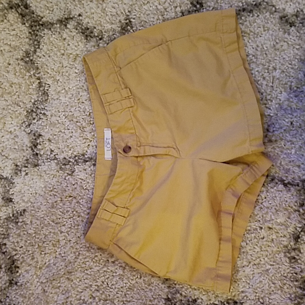 Ladies Loft shorts... approximately 4 in inseam... the color is brownish tannish